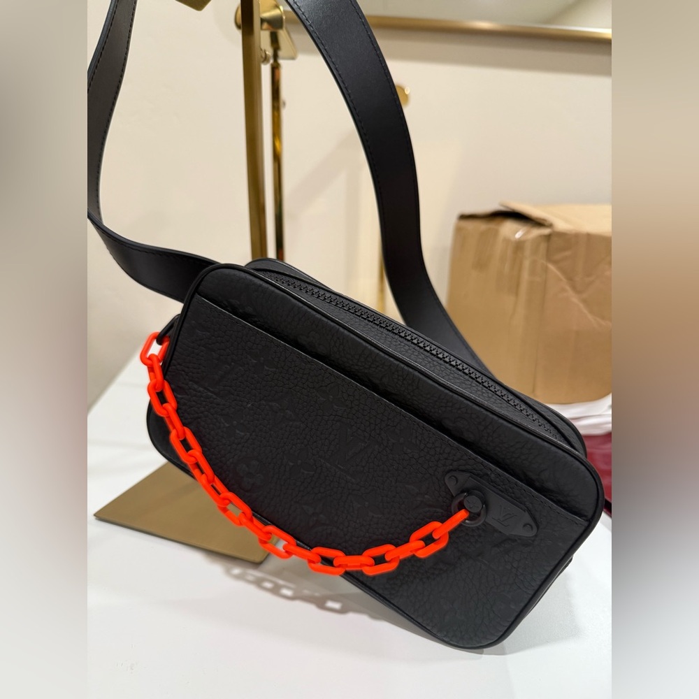 NEW RARE Louis Vuitton TAURLIN black empriente leather sling bag W/ orange chain